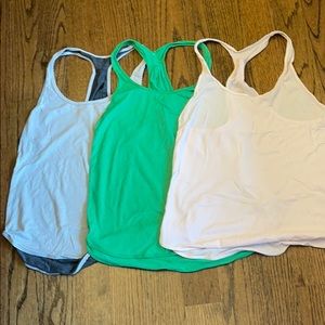 Three Lululemon Swiftly Tech Racerback tank tops